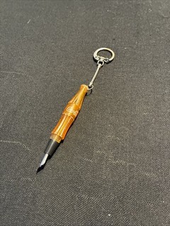 Coca Cola branded miniature bottle promotional keychain With Fountain pen.