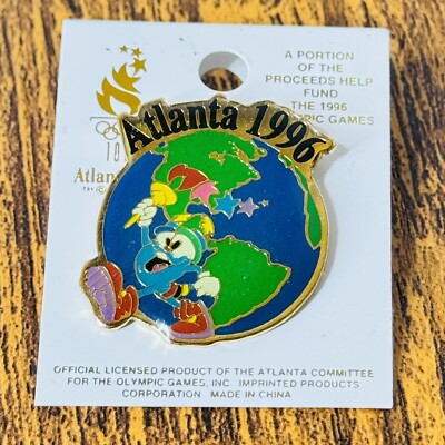 1996 Atlanta Olympics Pin Izzy with torch & Globe. New on backing. Hard to find
