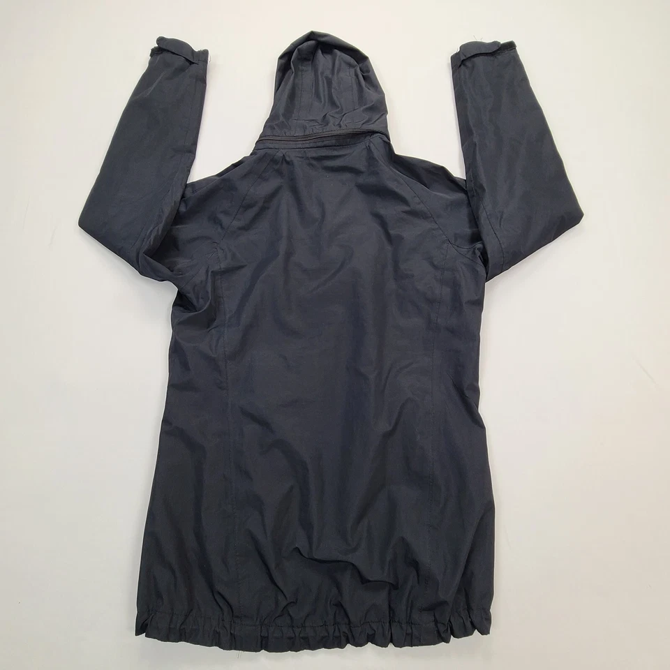 Chaqueta cortavientos Port Authority para mujer pequeña negra con capucha aire libre damas Foto 2 de 4