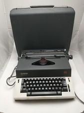 VTG Olympia Report De Luxe Electric Typewriter w/Case Powers On Needs Restored thumbnail