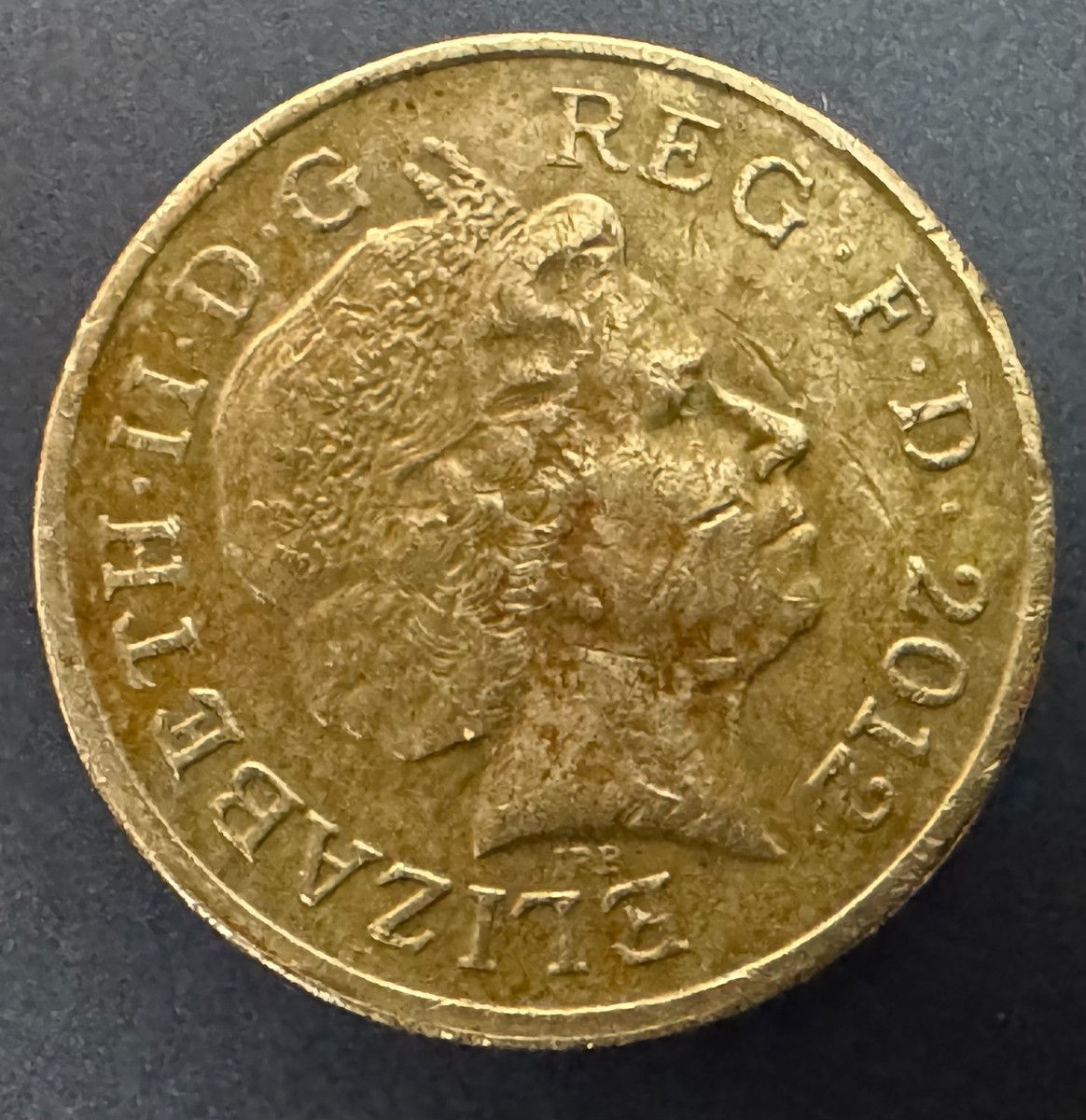 2012 Elizabeth II One Pound UK Coin, Decus Et Tutamen Upside Down