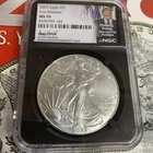 2025 $1 AMERICAN SILVER EAGLE NGC MS70 FR DONALD J. TRUMP FACSIMILE LABEL signed