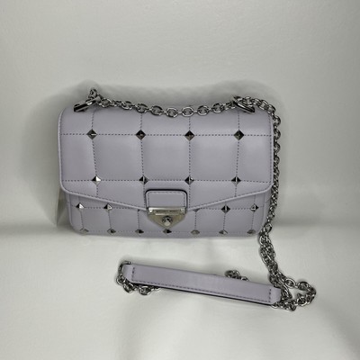 soho small studded leather and canvas shoulder bag
