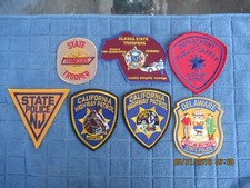 7 state police patchs for display only new jersey/tennessee/alaska/delaware