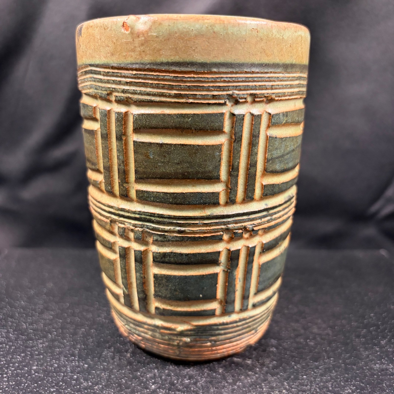 Angular brutalist terracotta studio vase with geometric relief, made by Hal Lasky in Puerto Rico.