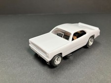 AUTO-WORLD  DUSTER F/C unpainted  NEW  for AFX, AURORA, TYCO  SALE 33.00