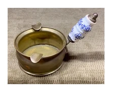 VERY VINTAGE BRASS TWO SLOT ASHTRAY WITH PORCELAIN DESIGNED HANDLE