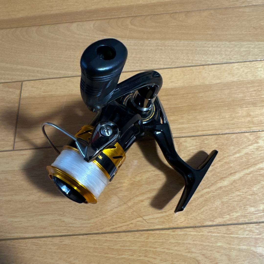 Spinning reel black gold
