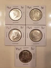 Lot of 5 Silver Kennedy Half Dollars, all dated 1964.