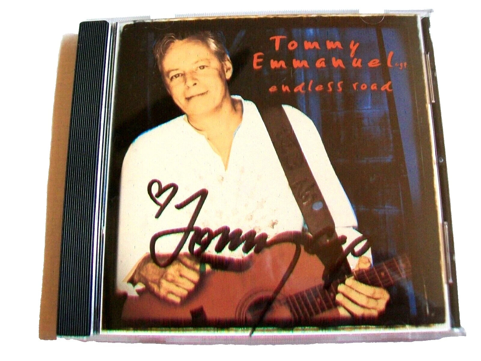 CD de música rock Tommy Emmanuel