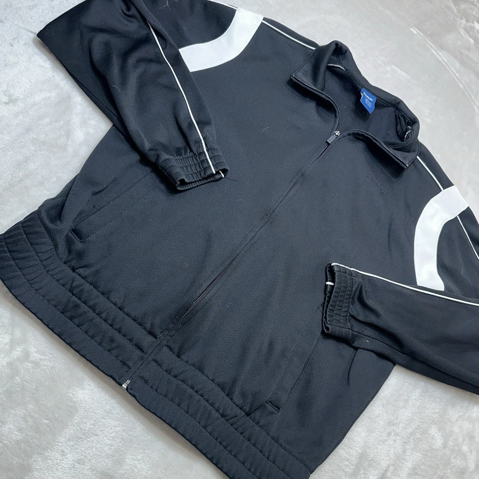 Женская спортивная куртка Reebok Размер L Цвет черный Карманы на молнии - Изображение 3 из 4