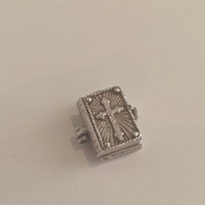 Beautiful sterling Silver vintage Nuvo opening bible charm.