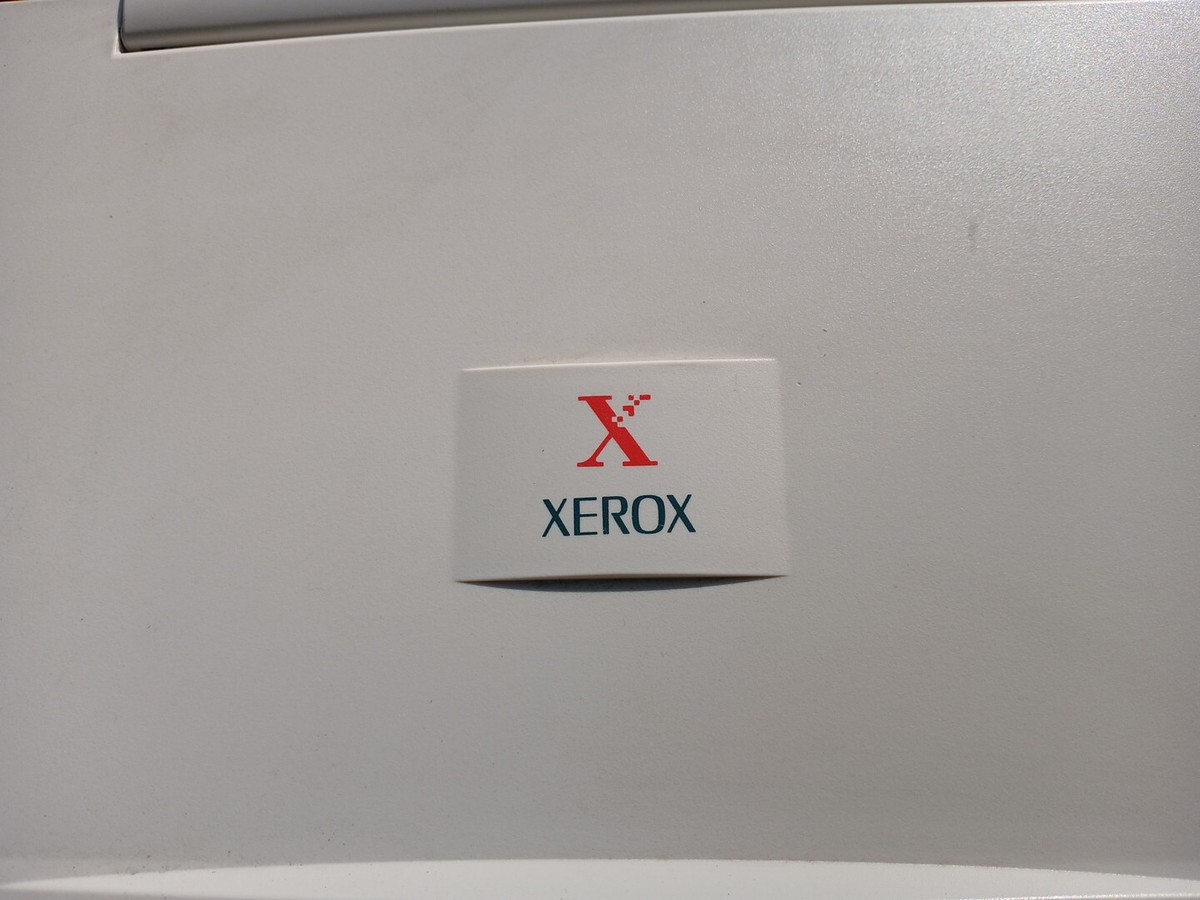Xerox XC356 Copy Machine, Powers ON/Prints black Stripes. For