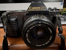 Canon T50 35mm SLR Film Camera w/ Canon FD 50mm 1:18 Lens. Tested Working