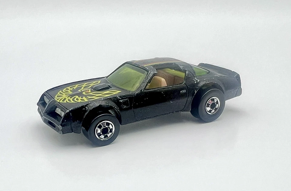 Hot Wheels 1977 Black Hot Bird Pontiac Trans Am RARO (vidrio amarillo) Foto 2 de 4