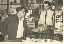 VINTAGE DRUGSTORE PHOTO! DRUGGIST SHOWING CAMERA TO CUSTOMER! CIGAR & PIPE DEPT
