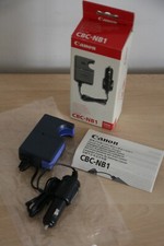 Caricabatteria auto Canon CBC-NB1 nuovo imballato per batterie NB-1LH foglietto istruzioni #1.