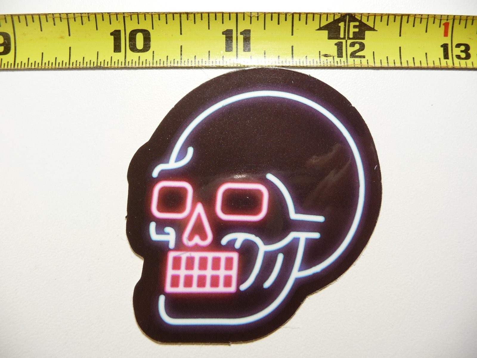 Colorful Neon Skull with Teeth Window Sticker for Fun Celebrations