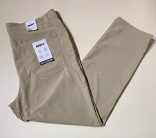NWT DKNY Men's Slim FIT Universal Tech Pant  Expandable Waist Pale Khaki All SZ