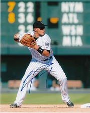 CRISTHIAN ADAMES  COLORADO ROCKIES   ACTION SIGNED 8x10