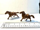 Marx 1950's original 60mm pair of "Chubby" brown horses as shown.