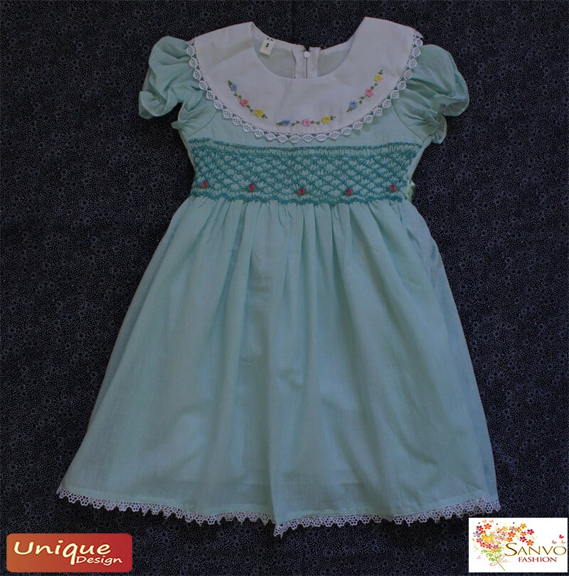 Baby frock smocking best sale designs