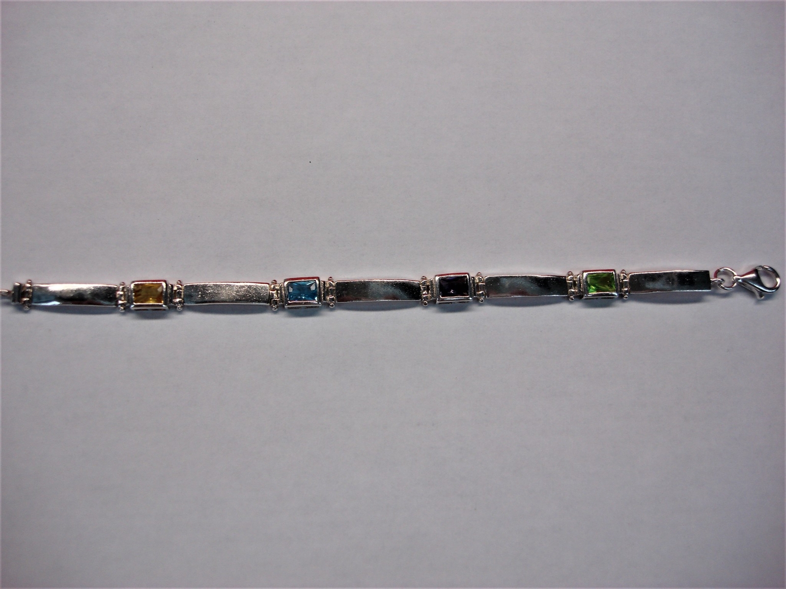 SOLID STERLING SILVER BRACELET WITH 4 DIFF. COLOR… - image 1