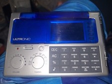 Ultronic WS-9 World Traveler Portable Flip Up Alarm Clock Radio Calculator
