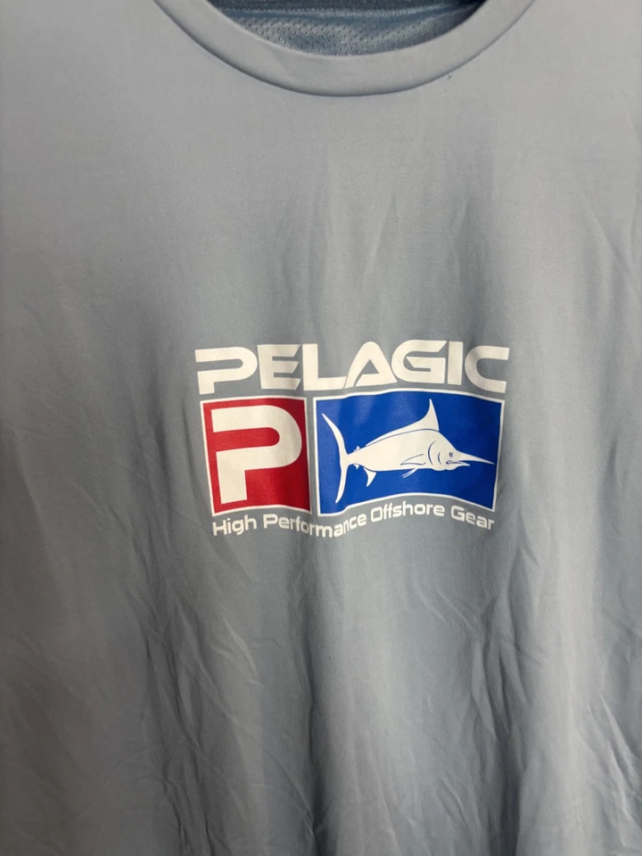 Camisa de golpe de agua salada Pelagic AquaTek pequeña azul manga larga rendimiento pesca Foto 2 de 4
