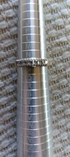 9Kt gold Ladies Eternity ring Size O Diamond chip half the Ring 1.68Grm weight