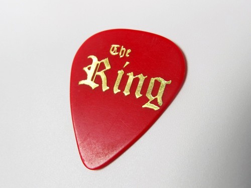 VTG Vintage Used Pre-Owned "The Ring" Red Guitar Pick w/ Metallic Gold Letters