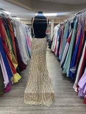 Gold Sequin Sleeveless V-Neck Formal Gown with High Slit Geometric Pattern