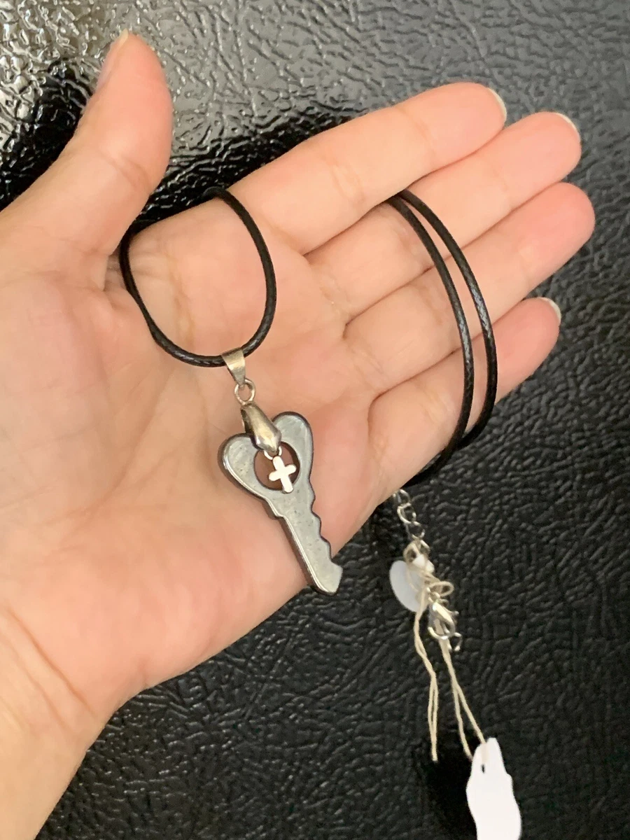Black cord 2024 necklace with charm