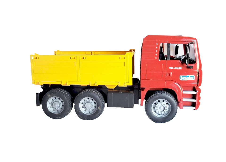 Camión de volteo Bruder Man rojo amarillo construcción hecho en Alemania Foto 3 de 4