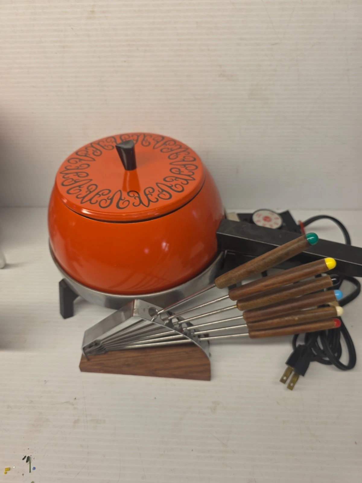 Vintage Mid Century Kitchen Fondue Set Orange Enamel Pot teakwood forks 1970s
Opens in a new window