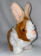 Hopping Bunny Battery Operated White  Orange 9 Inches High Foot To Top Of Ear