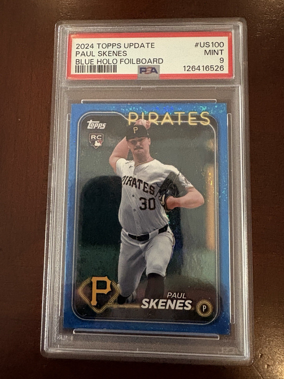 2024 Topps Update Paul Skenes RC #US100 Blue Holo Foilboard 712/999 PSA 9 POP 23