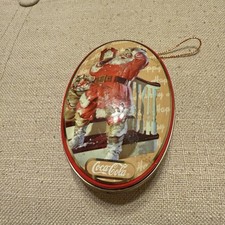 Vintage Coca-Cola Santa Oval Tin Ornament Opens On Both Sides