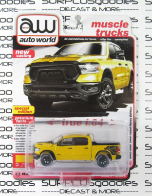 Auto World 2024 R4 Muscle Trucks: Baja Yellow 2023 RAM 1500 REBEL HAVOC Edition