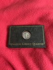 1927 full date Silver Standing Liberty Quarter in Stone Display Case