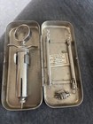 black leg cow vaccine syringe in case