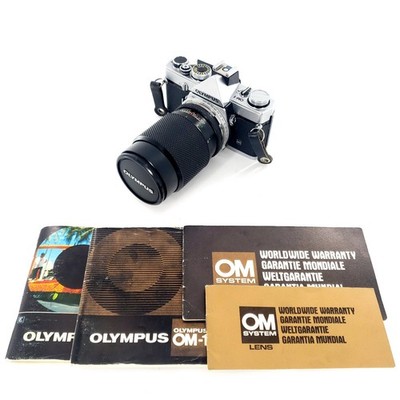 Olympus OM 1 35mm SLR Film Camera with 75-150mm Lens w/ Quantaray 135mm f/2.8