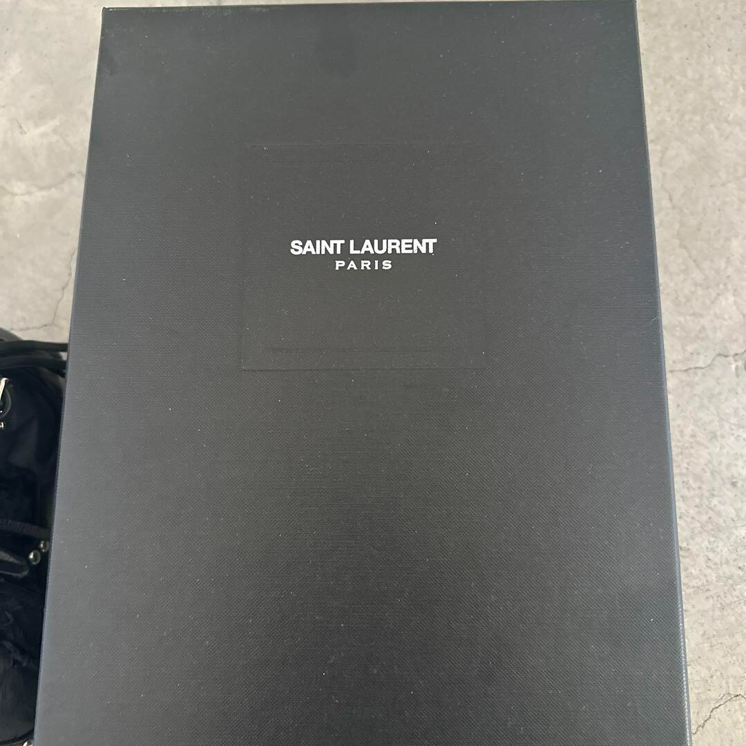 Sandali piatti gladiatore YSL Saint Laurent borchie frange pelle nera taglia 36 US6