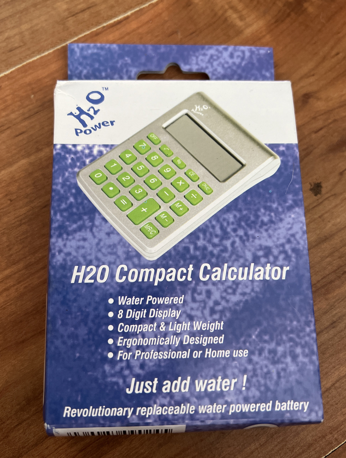 H2o Compact Calculator with Replaceable H2O Water Battery
