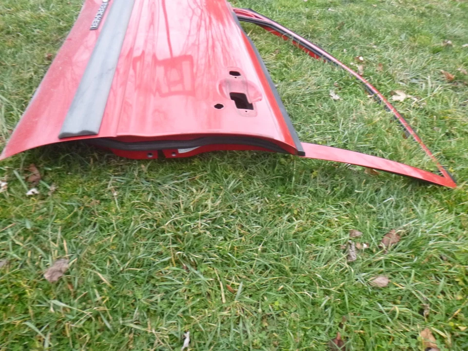 Chevrolet Tracker 2002 puerta delantera lado del conductor delantero izquierdo rojo Foto 4 de 4