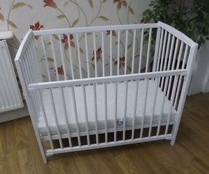 small white cot