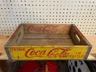 Vintage Coca Cola yellow wooden crate, marked Chattanooga 1965.