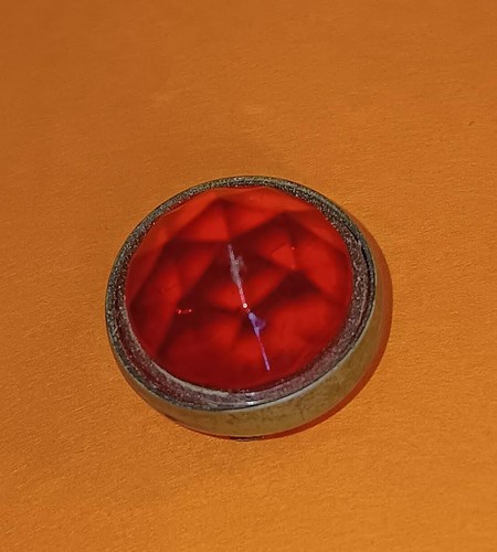 Vintage bicycle reflector gem. glass and with a nickel plated housing. 5/8"