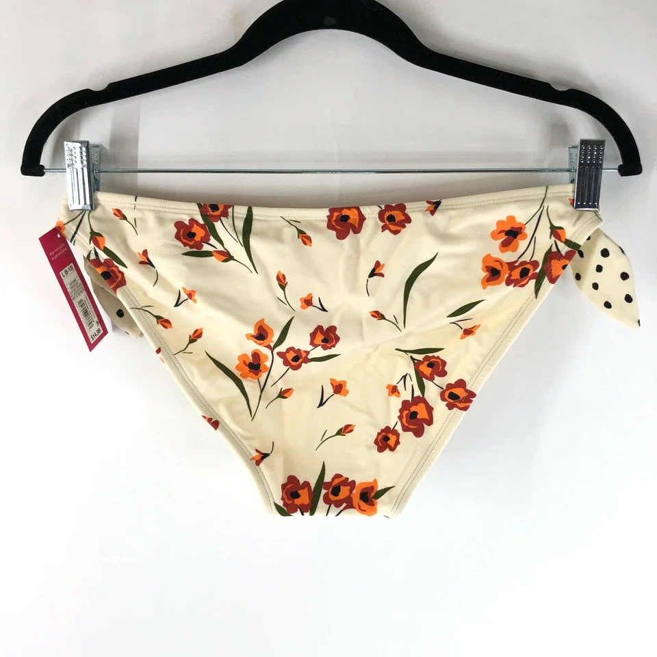 Parte inferior de bikini Xhilaration para mujer descarada floral lazo laterales marfil talla L Foto 2 de 4