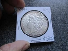 1899's MORGAN SILVER DOLLAR  in VERY NICE  UNCIRCULATED condition. RARE DATE!
